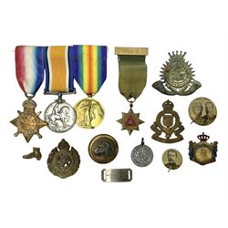  Made-up group of three WWI medals comprising 1914 Star awarded to 23598 Gnr. F. Jefferson R.G.A., British War Medal and Victory Medal with names removed; with ribbons on wearing bar; 1942 Motorist's Medal and small quantity of cap badges, Royalty badges etc