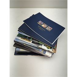 Three Moorcroft reference books, comprising Winds of Change, The Phoenix Years and A New Dawn, together with a collection of Moorcroft magazines 