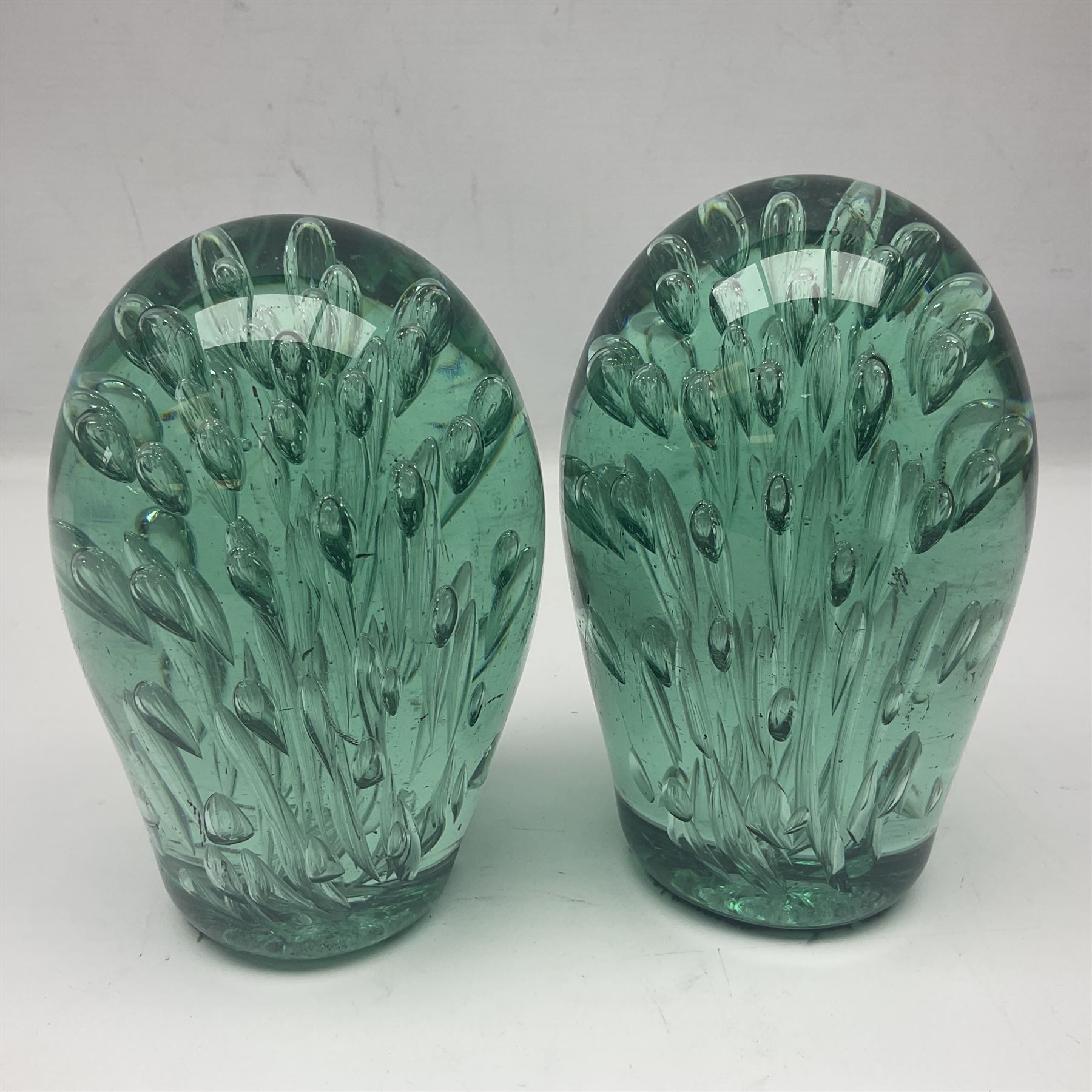 Pair of Victorian green glass dump paperweights with air bubble inclusions, together with Caithness paperweight and three other paperweights, dump H15cm