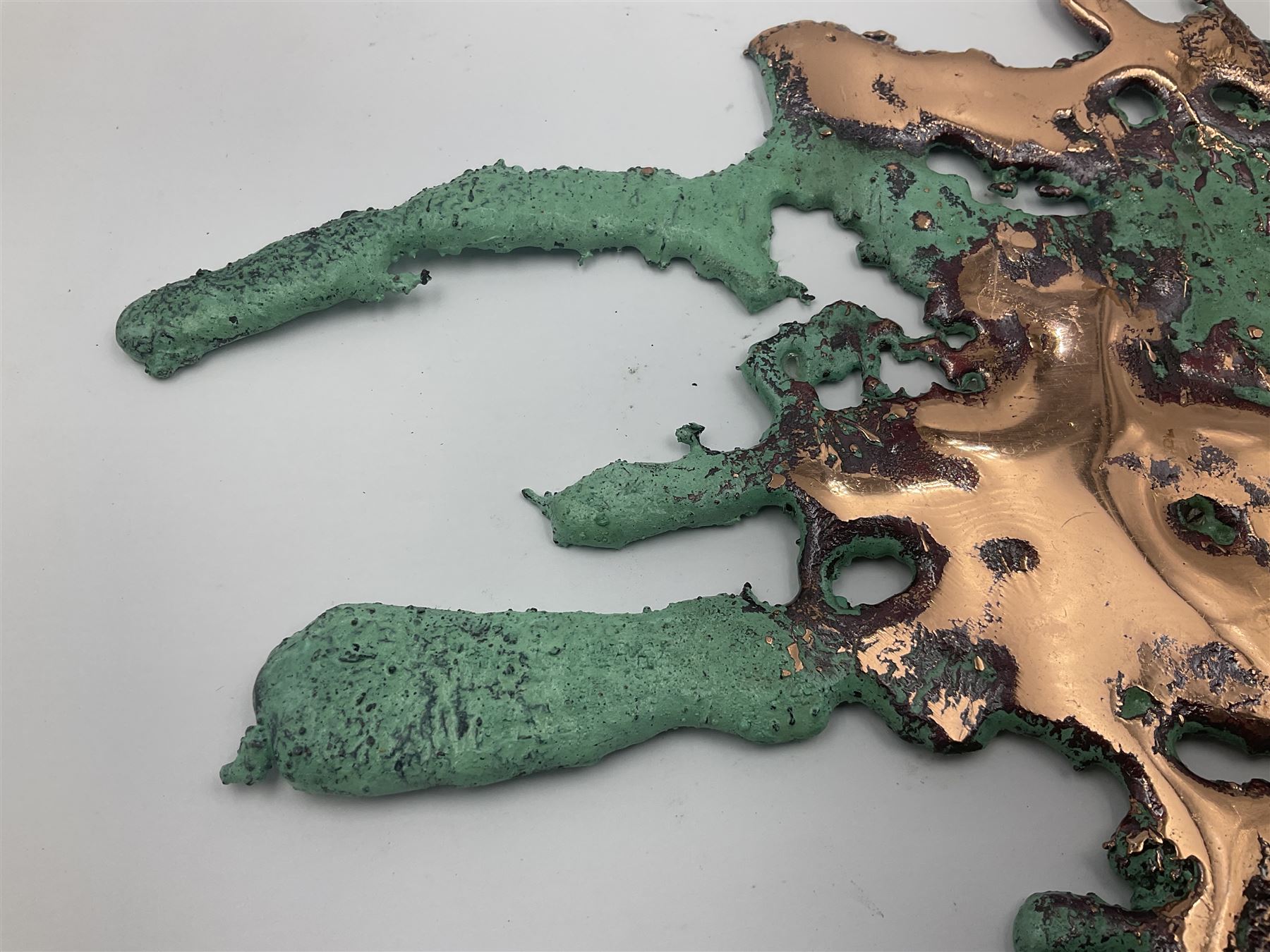 Large free form copper splash, with green patina and polished copper accents, at largest point H18cm, L23cm