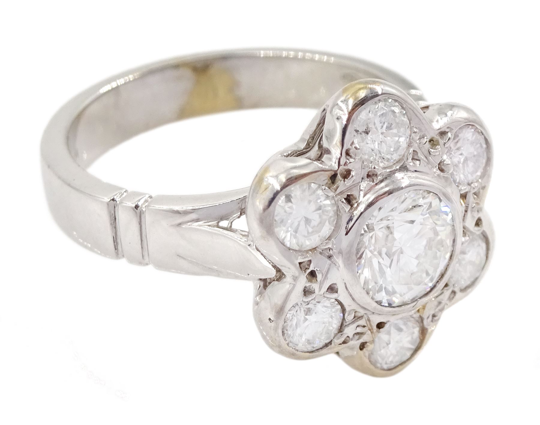 18ct white gold seven stone round brilliant cut diamond daisy flower head cluster ring, hallmarked, principal diamond 0.74 carat, with GIA report, total diamond weight approx 1.40 carat