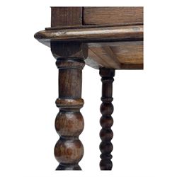 Late Victorian oak side table, rectangular top with moulded edge and frieze drawer with brass handle, raised on turned bulbous supports united by square-section stretchers