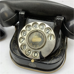  A Vintage black Bakelite telephone, together with another vintage metal bodied example with Bakelite receiver, marked Bell.   