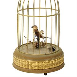 Reproduction automaton of a bird in a cage