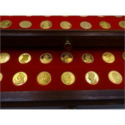 Danbury Mint, Our Royal Sovereigns Collection, seventy 22 carat gold plated silver medallions depicting the complete line of British monarchs to mark the 1200th anniversary of the first coronation, contained within wooden table top collectors cabinet with two drawers, with certificate of authenticity, with two drawers, hallmarked Danbury Mint, London various dates
