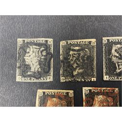 Seven Great Britain Queen Victoria penny black stamps, three with black and four with red MX cancels