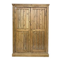 19th century pitch pine housekeepers cupboard, two plank panelled doors enclosing three shelves
