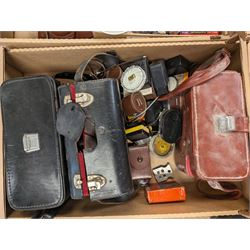 Large collection of camera equipment and accessories, including cases, flashes, films etc