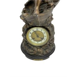 An imposing bronzed spelter clock depicting a 19th century  fisherman, on a circular ebonised base with a plaque entitled “Cod Fishing” with a Parisian eight-day striking movement striking the hours and half-hours on a coiled gong, two-part dial with a gilt centre, ivorine chapter inscribed with upright gothic Arabic numerals and minute markers, with steel gothic hands within a brass bezel and flat bevelled glass. With pendulum.   



