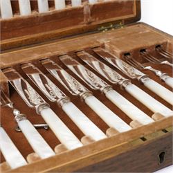 Set of twelve dessert knives and forks with engraved plated blades, silver collars and mother of pearl handles by Walker & Hall in oak box Sheffield 1927 and a set of twelve plated fish knives and forks with servers, boxed