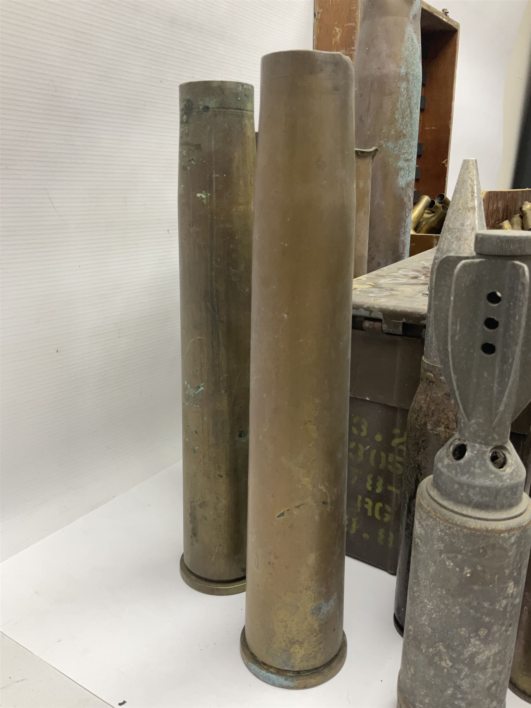 Large collection of shell and bullet casings, including a trench art example, together with a metal cartage case and wooden case