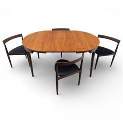 Frem Røjle - Danish teak 'Roundette' extendable dining table, circular top with softly chamfered edge and internal stowable leaf extends to 156cm, raised on four tapered cylindrical legs, accompanied by four matching dining chairs with shaped teak frames and black vinyl upholstered seats, the chairs designed to nest beneath the table when not in use