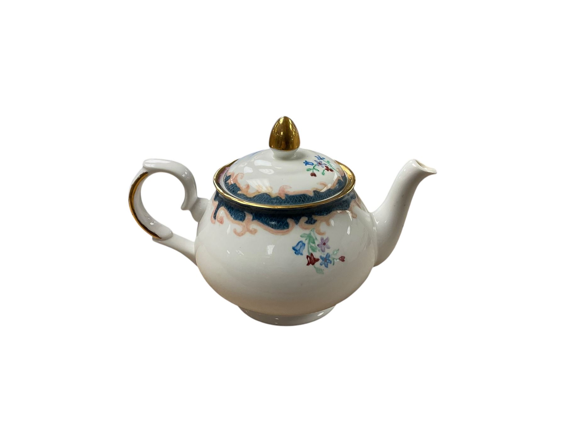  Wedgwood Chartley pattern dinner service for six, including dinner plates, dessert plates, six twin handled soup bowls etc, together with a near matching teapot