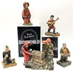 Terry Pratchett Discworld figures, designed by Clarecraft, comprising Rincewind and Luggage bookend DW41, Imp Y Celyn, DW81, C.M.O.T Dibbler, DW35, Rincewind, DW01 and Susan Sto Helit, boxed, DW77