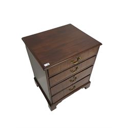 Small 19th century mahogany four drawer chest, with matched through veneers, on bracket feet