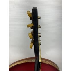 Early 20th century Italian Rafaele Disantino eight-string mandolin with two-piece back and spruce top with stamped Rafaele Disantino signature; bears maker's label L61cm; in wooden carrying case