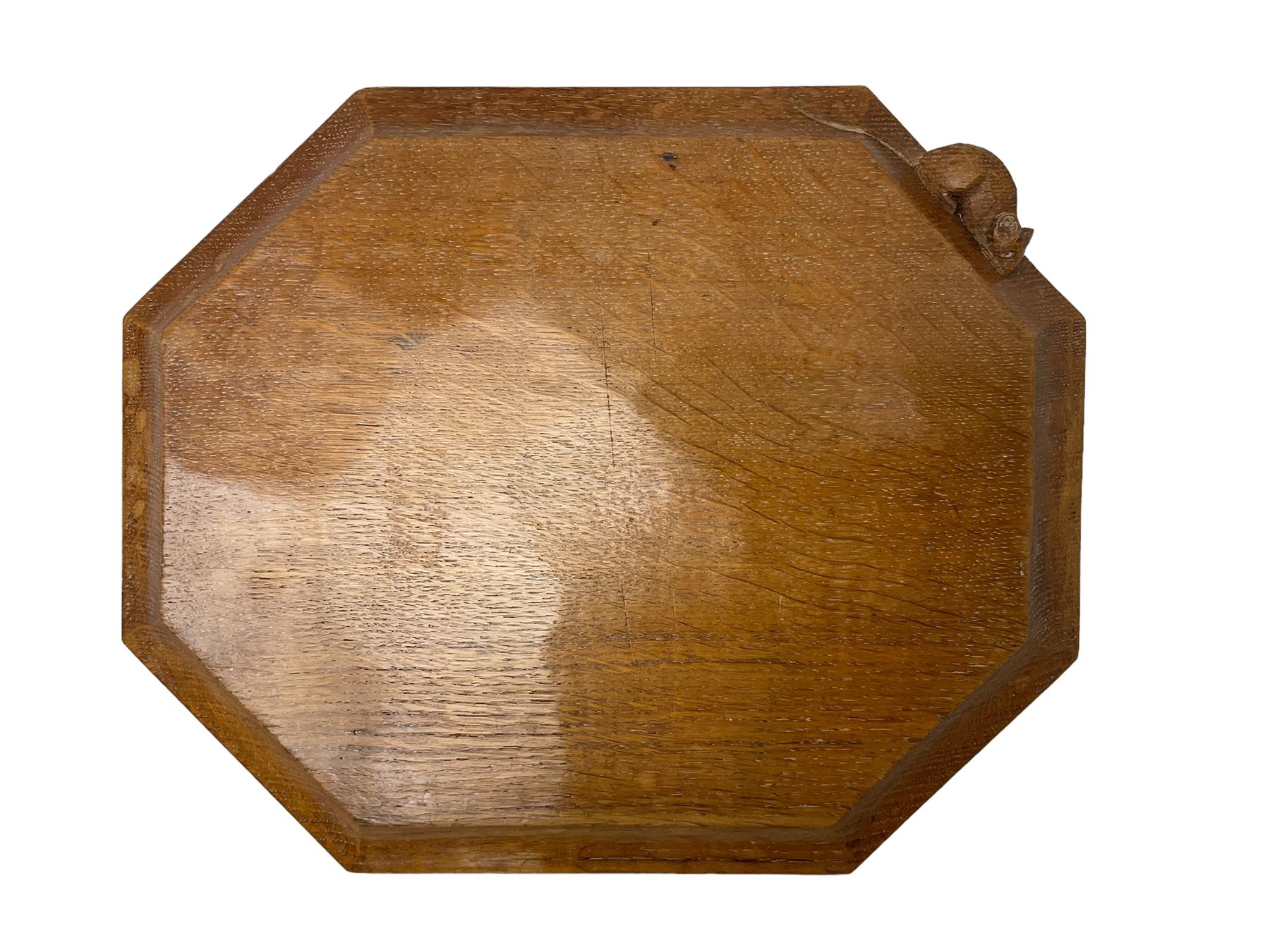 Mouseman adzed oak breadboard, canted rectangular form with moulded