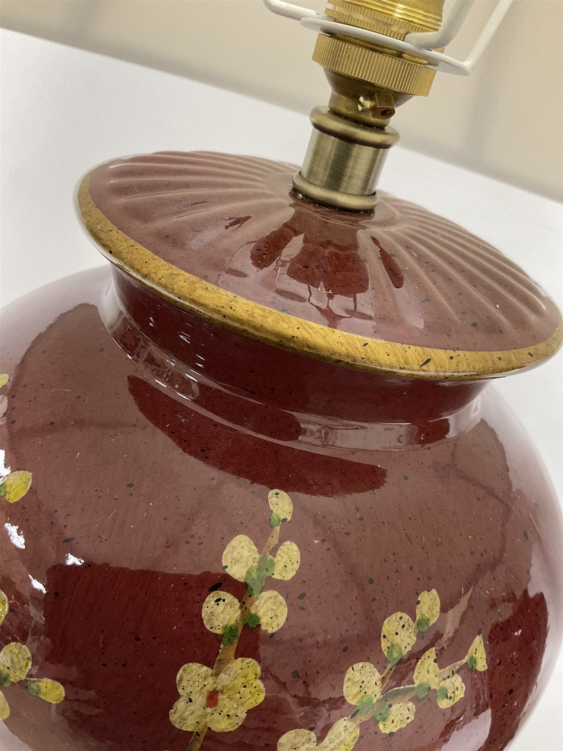 Pair of large table lamps of tapering form, decorated with Japanese blossom on a red ground, upon a square base, including shade H72cm