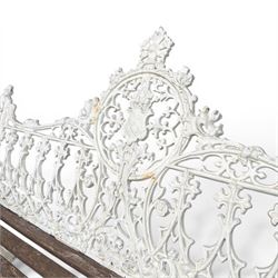 Coalbrookdale Gothic design cast iron and slatted teak garden bench, the ornate pierced back and sides of arched design, with central cartouche shield surrounded by stylised crosses and trefoils with interspersed flowerheads, the scrolled arm terminals with stylised griffon motifs and trailing fruiting vines 