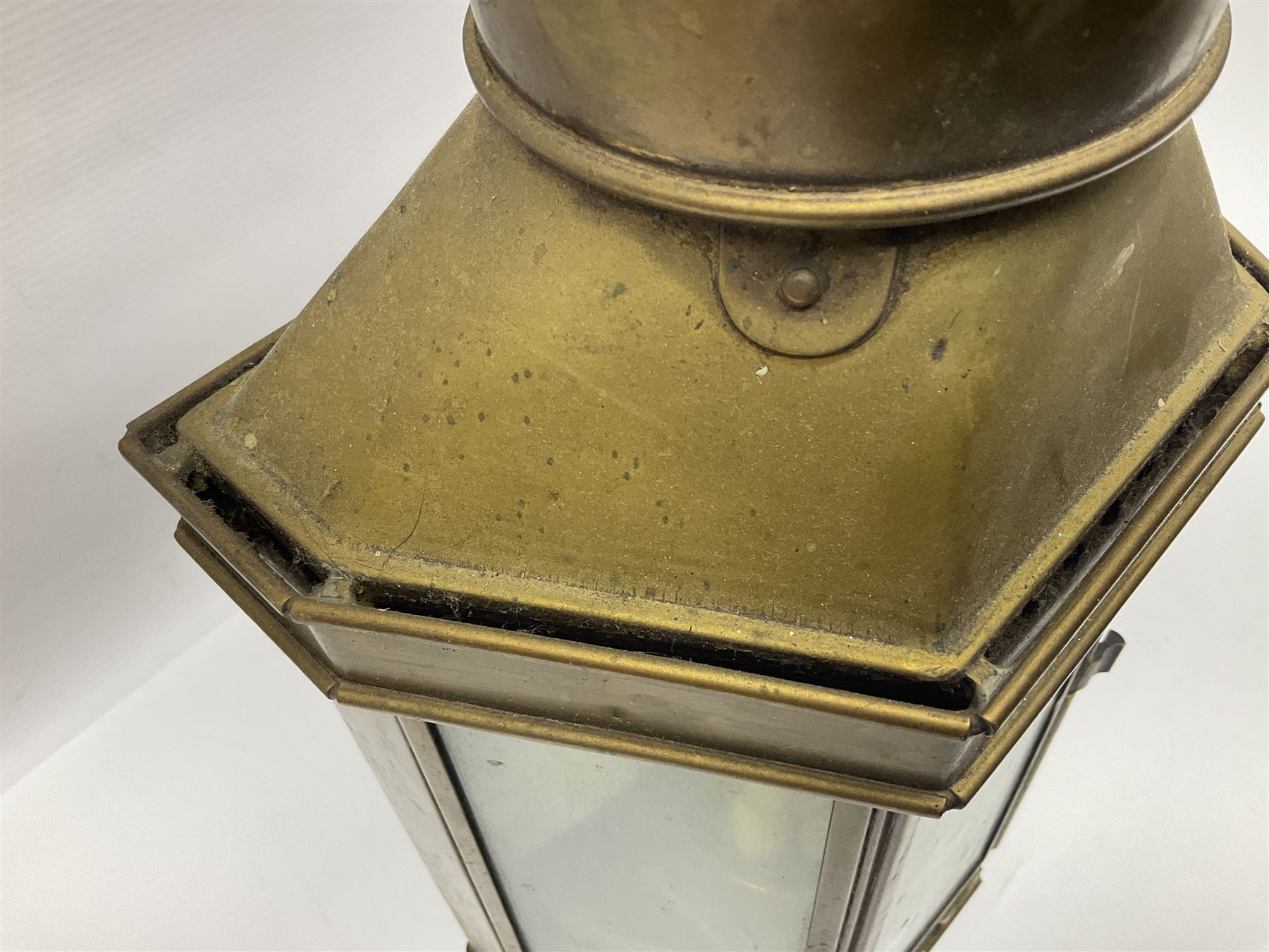 Large brass maritime lamp by Griffiths & Sons Birmingham with swing handle, threaded mounting bracket and associated oil burner, H41cm excluding handle