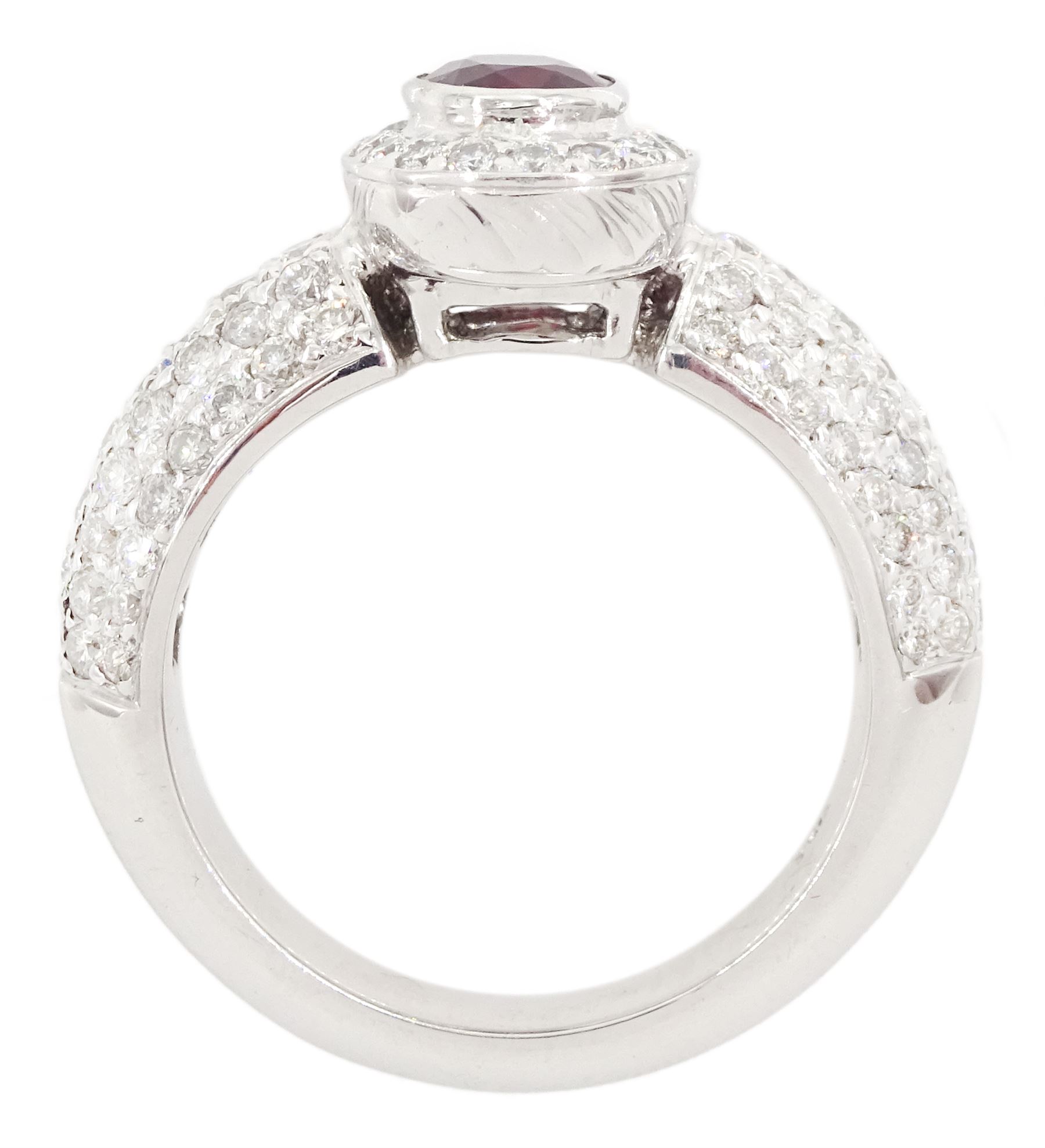 18ct white gold oval cut ruby and round brilliant cut diamond cluster ring, with pave set diamond shoulders, stamped 750, ruby approx 1.05 carat, total diamond weight approx 1.00 carat