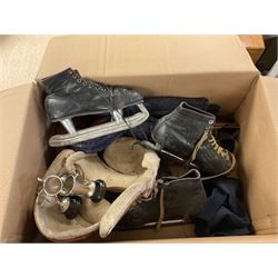 Collection of vintage sporting items, including ice skates