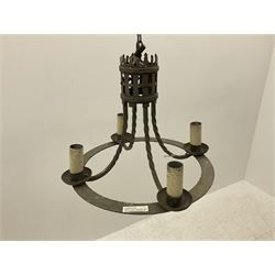 Gothic style iron chandelier with drip pans and twisted branches together with three matching twin wall sconces