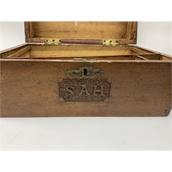 20th century oak writing slope with ornate brass escutcheon, the front engraved ‘S A H’ and the hinged lid decorated with engraved flowers lifting to reveal compartmented interior, for restoration, and another mahogany writing box