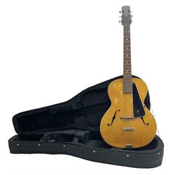 1950s acoustic guitar with f-holes and pickguard L105cm; black fur lined hard carrying case