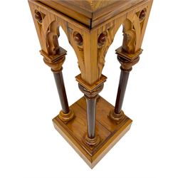 19th century pitch pine ecclesiastical pedestal stand, the square chamfered top over cusped Gothic pointed arches and four turned column supports, stepped and moulded plinth base