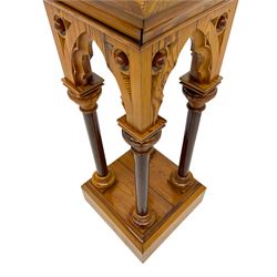 19th century pitch pine ecclesiastical pedestal stand, the square chamfered top over cusped Gothic pointed arches and four turned column supports, stepped and moulded plinth base