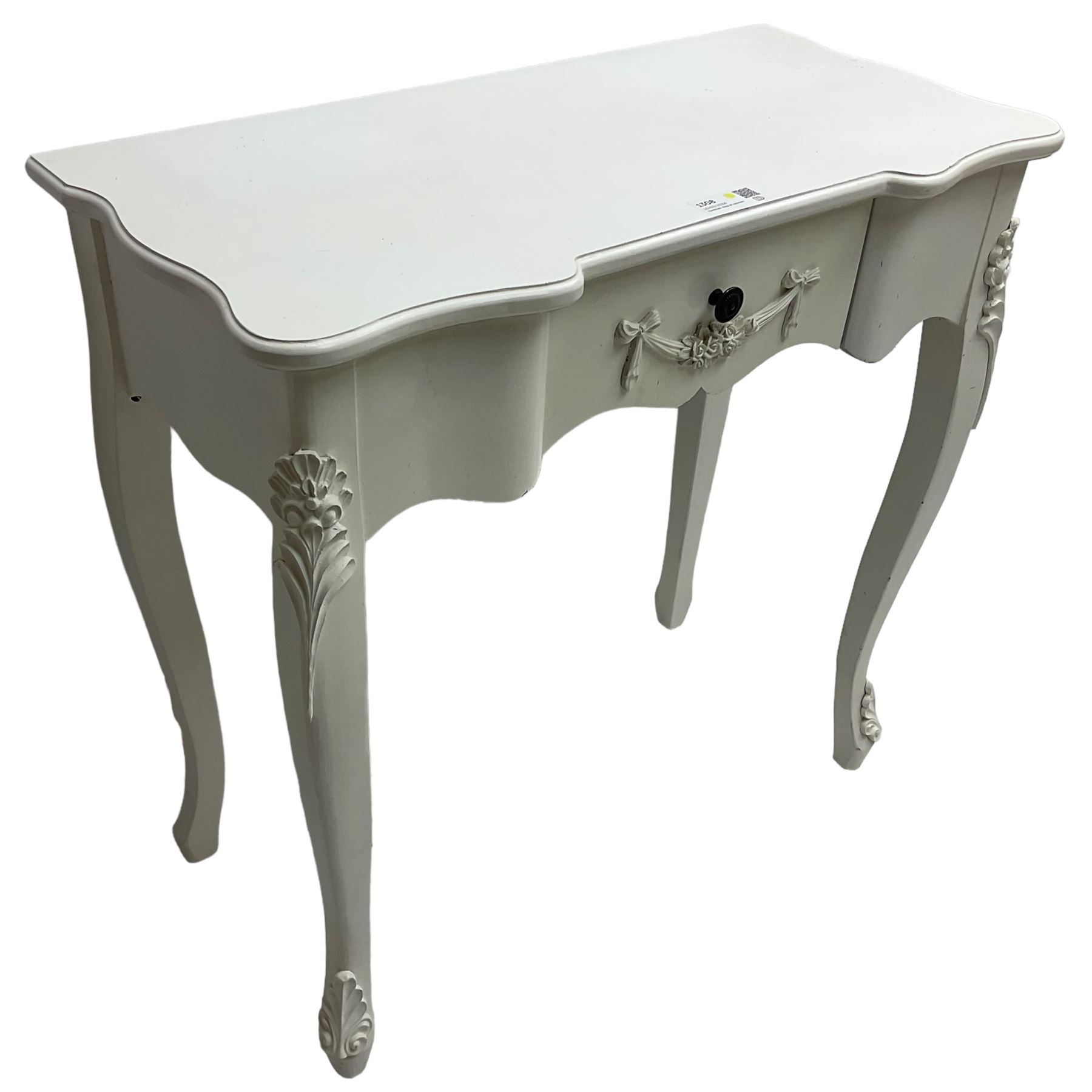 French design white painted console table, shaped top, fitted with single drawer with applied swag decoration, raised on cabriole supports decorated with foliate mouldings
