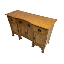 Early 20th century Arts & Crafts oak dresser, reverse break bow front top, fitted with three drawers, double cupboard and two single cupboards