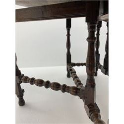 Late 17th century William & Mary oak drop leaf dining table, oval drop leaf top, single drawer to one end, gate action base, turned supports joined by bobbin turned stretchers, 121cm x 135cm, H75cm (open)