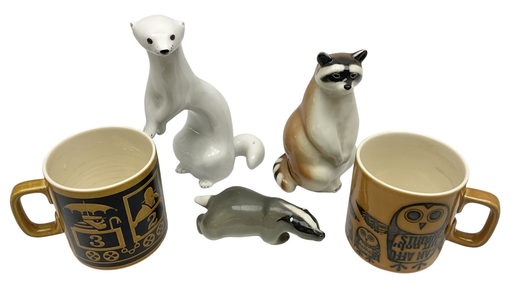 1970's Hornsea mugs, comprising Train Robber pattern designed by John Clappison and Owl from the ‘Newsprint’ Zoo range designed by Jack Dadd, and three USSR figures of animals comprising raccoon, ferret and badger
