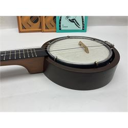 W.D. Keech banjolele pat.219720/23 with etched signature to the back; serial no.A12082 L55cm; and a restored Italian mandolin with segmented lute back; together with three music books