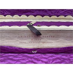 19th century leather suitcase, with brass plaque to cover engraved 'C R F Lutwidge Esq', the pink silk and white kid leather interior with pouch and edging impressed with gilt lettering reading 'By Appointment of Prince of Wales J W Allen 37 Strand Maker Prize Medal Awarded', H21cm, W73cm, Notes: Charles R. Fletcher Lutwidge, was mayor of Tunbridge Wells between 1895-1898, and again between 1901-1902