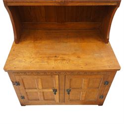 Gnomeman - adzed oak dresser, arcade carved cresting rail over two lead glazed doors, double cupboard below enclosed by two panelled doors, with carved gnome signature, by Thomas Whittaker of Littlebeck 