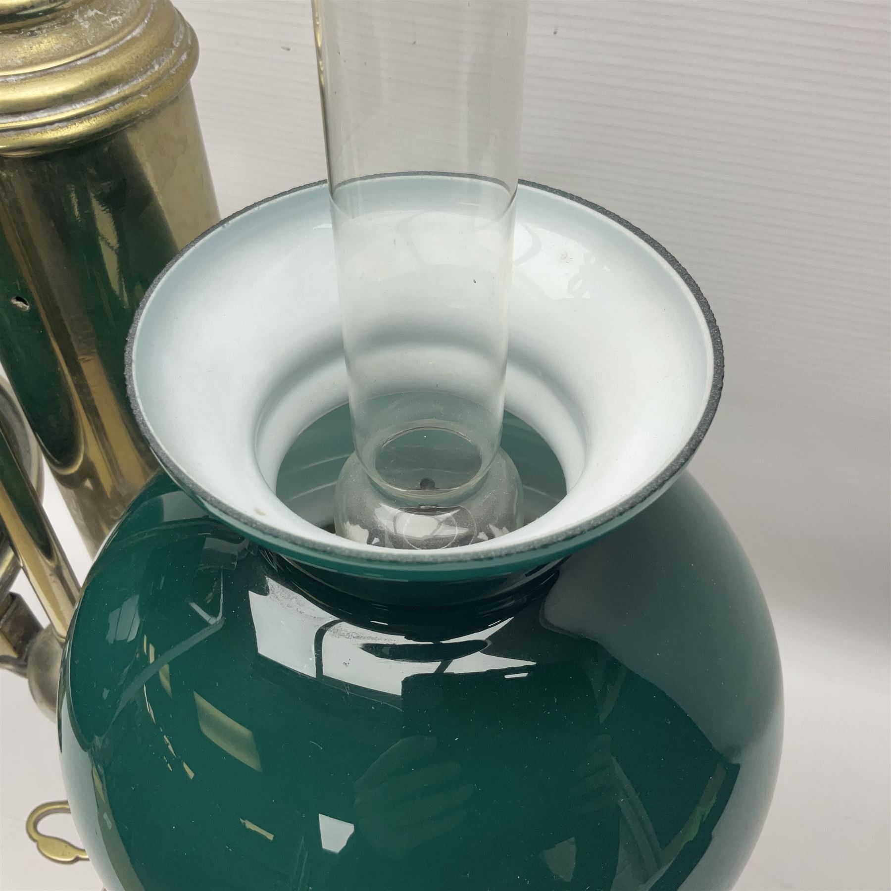 Miller & Sons Piccadilly polished brass double adjustable student's oil lamp, with green glass shades, H52cm