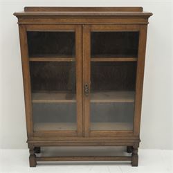 *Edwardian oak bookcase display cabinet enclosed by two glazed doors, W96cm, H128cm, D31cm