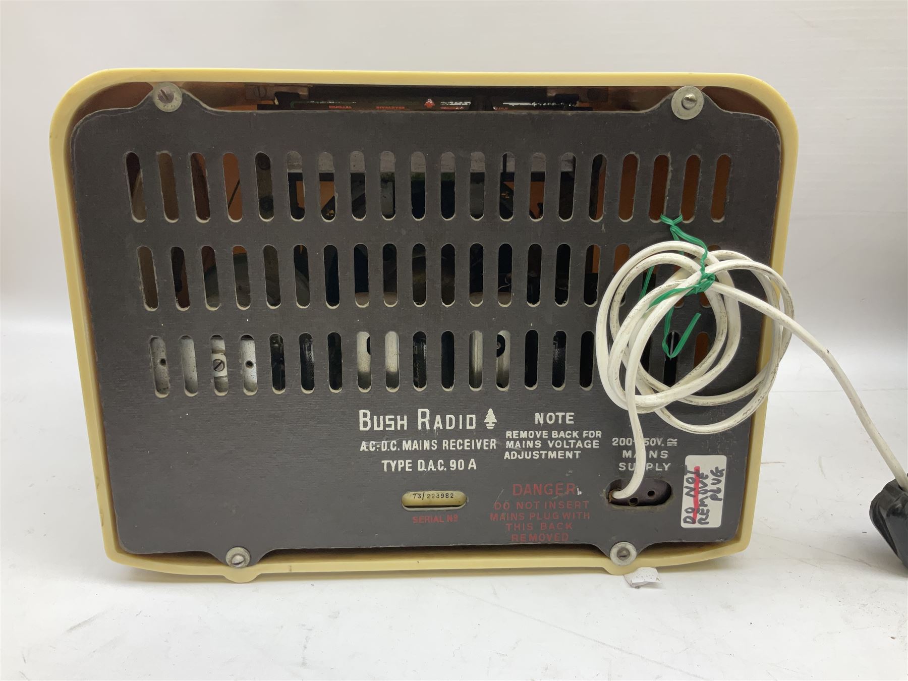 1950s Bush Type DAC 90A valve radio in cream Bakelite case, H23cm W29cm D19cm, together with Bush Type DAC 10 radio in brown Bakelite case
