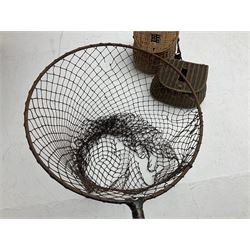 Fishing tackle and accessories housed in two wicker creels, including a landing net, fly tin, small brass reel, other reels to include two Intrepid Boy'o examples, crab lines etc 