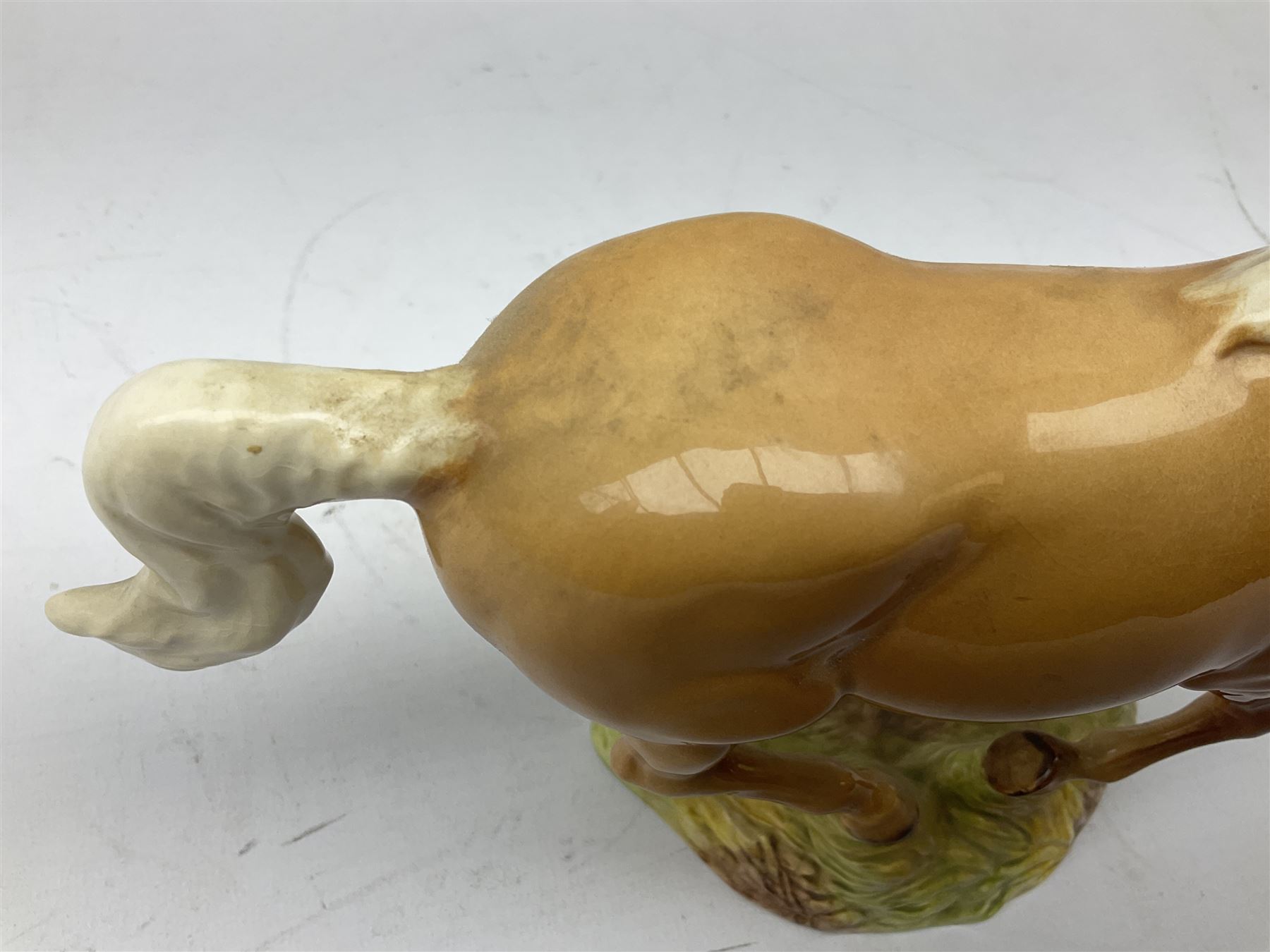 Beswick figure of cantering Palomino horse on base model no 1374, with impressed and printed mark beneath, H18cm