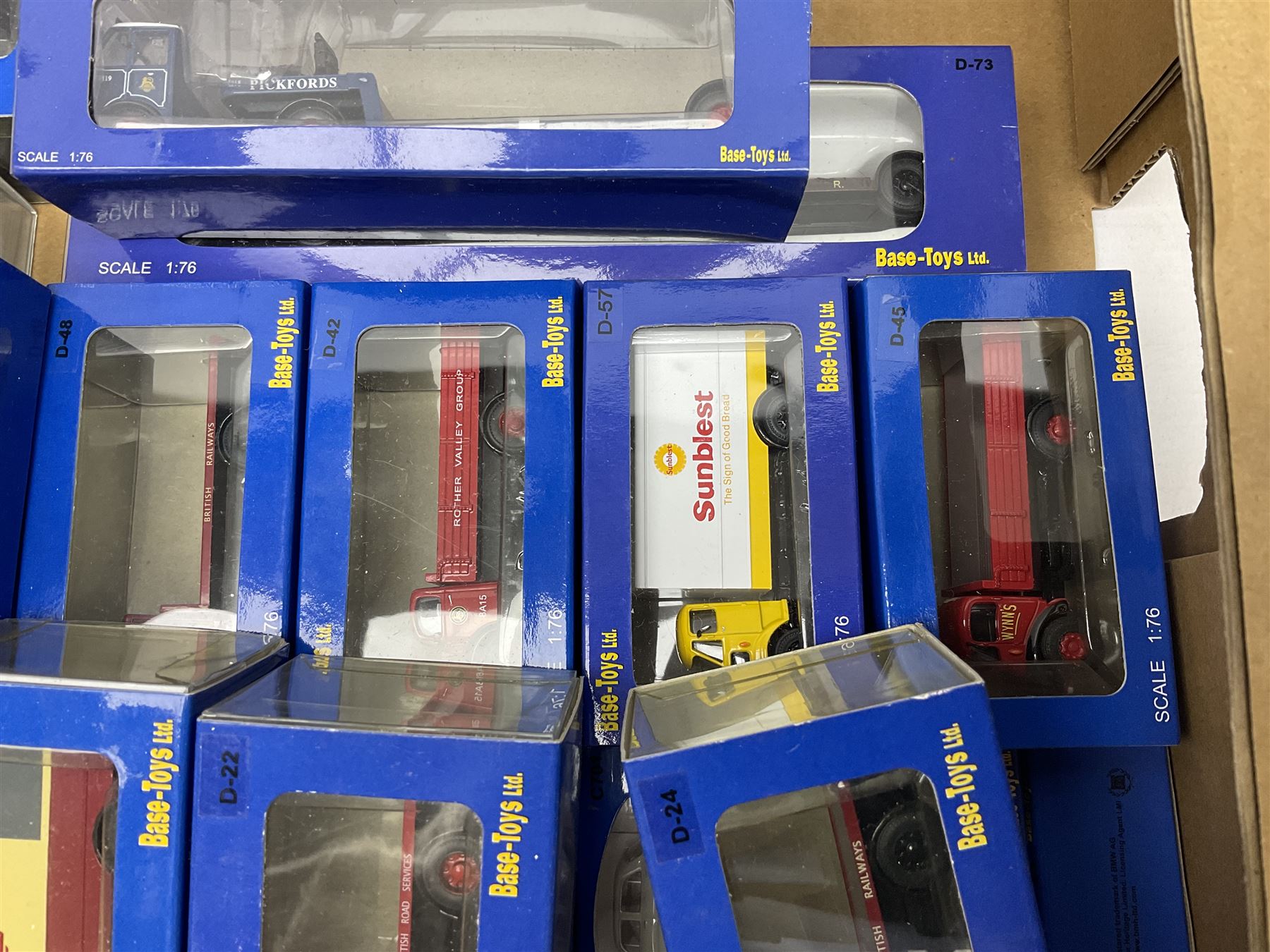 Fifty-seven Base Toys 1:76 scale die-cast models, all boxed (57)