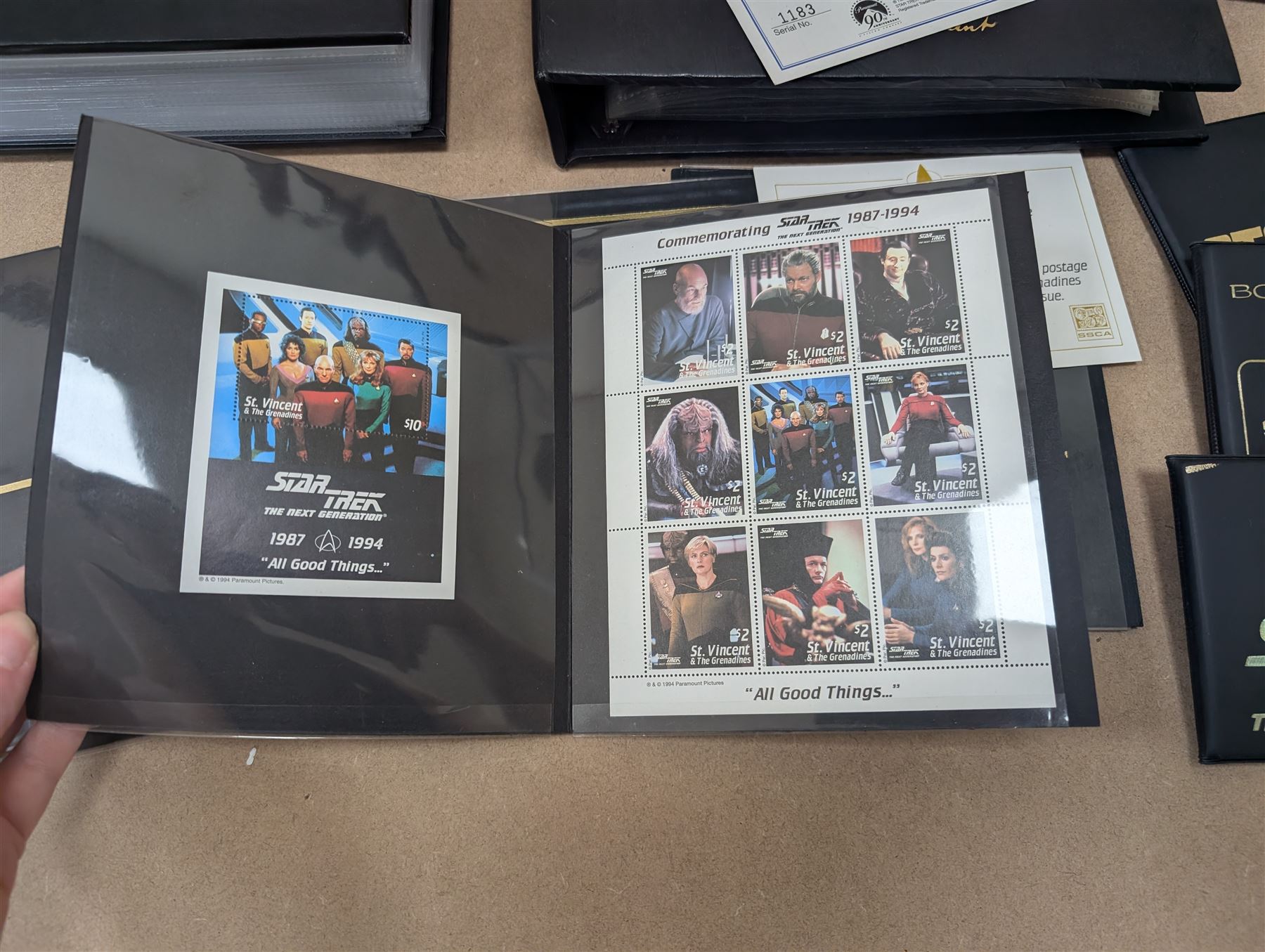 Star Trek collectables, including Danbury Mint '22ct Gold Card Collection', PCS Stamps and Coins Official US Postage Celebrating The Original Star Trek Series, Star Trek St Vincent and Grenadines first day cover collection, four stamp sets and a framed set of similar stamps, commemorative coins, Star Trek The Experience Las Vegas coin, three commemorative 'gold stamps' and three albums of collectors cards and telephone cards