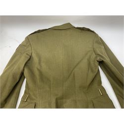 WW2 Army Great Coat and tunic named to Captain Hawkyard of The Argyll & Sutherland Highlanders (Princess Louises) with label dated 1944 from Wm. Anderson & Sons Ltd. Edinburgh and Glasgow; together with two Argyll & Sutherland Highlanders tartan pattern kilts with green rosettes to the front (4)