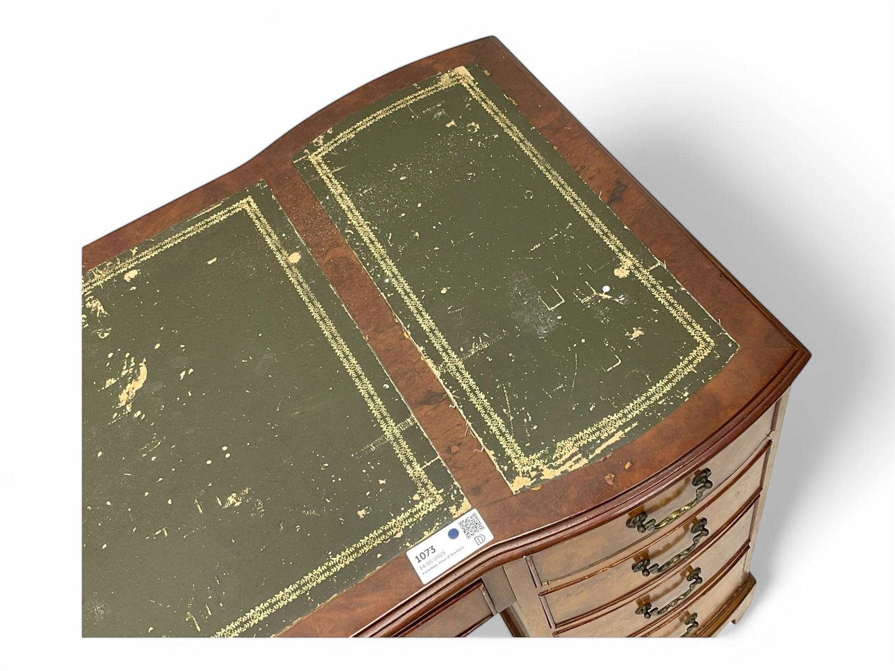 Queen Anne design burr walnut pedestal desk, of serpentine form with green tooled leather inset top, nine drawers with brass swan-neck handles, raised on bracket feet, in three parts