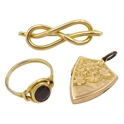 Edwardian 9ct gold shield design locket pendant, with bright cut foliate decoration, Birmingham 1908, gold single stone garnet ring and a 14ct gold knot brooch