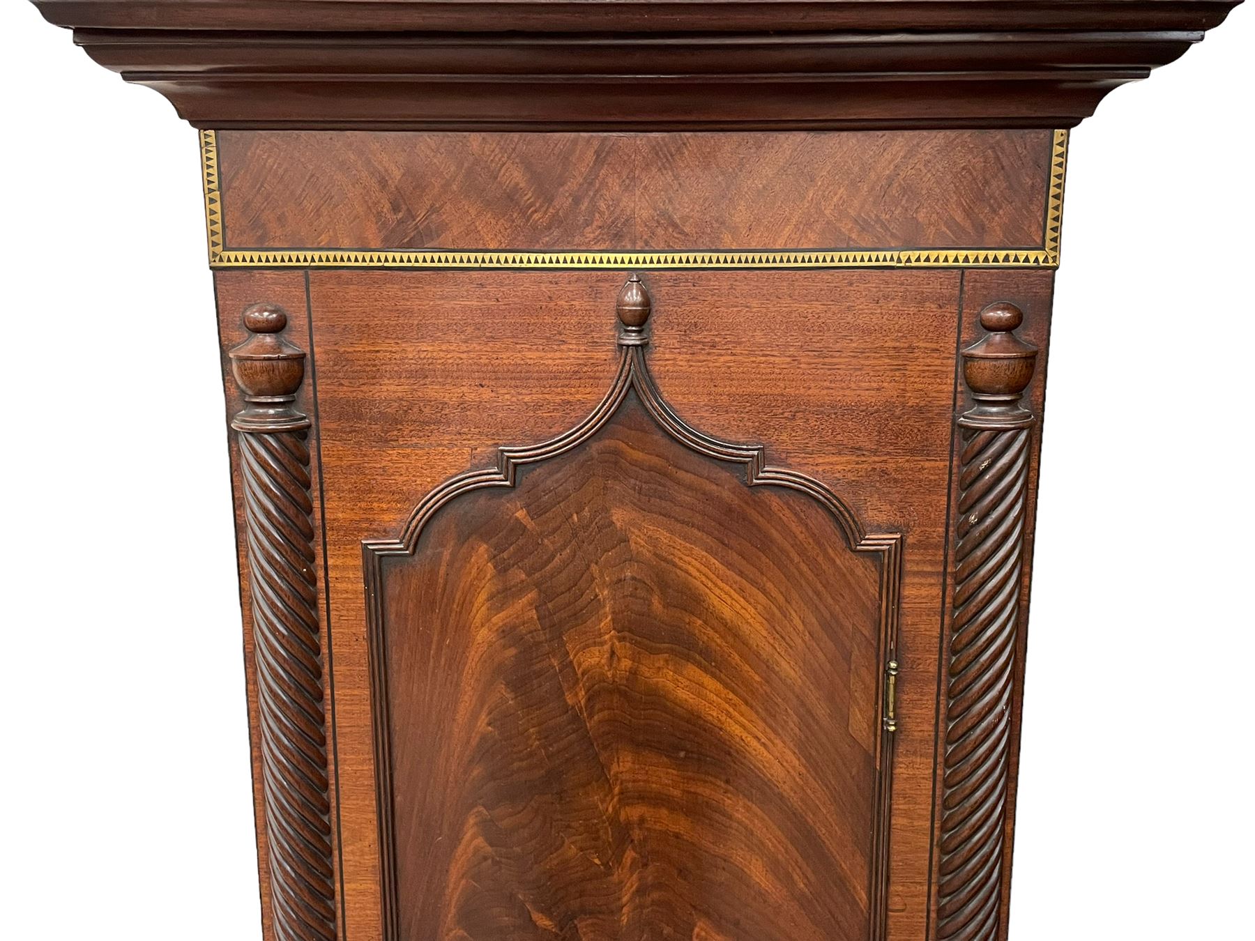 Nathaniel Dumville of Stockport - 8-day brass inlaid mahogany longcase clock c1840, swans neck pediment with ball and spire finials and wooden paterae, recessed break arch hood door flanked by rope twist pilasters, trunk with conforming pilasters and gothic ogee topped door, canted plinth raised on bracket feet, fully painted break arch dial with moon work and spandrels depicting the four seasons, centre with Roman numerals, minute track, subsidiary date and seconds dials, matching stamped brass hands, four pillar movement with an anchor escapement, rack striking on a bell. With weights and pendulum.
The Dumville family were prevalent Cheshire clockmakers working in Stockport 1820-42.
