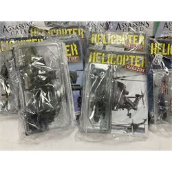 Fifteen Amer Czechoslovakia periodical issued metal models of helicopters each in unopened original packaging with copy of 'Helicopter Magazine'; together with seven unopened Hachette 'Assassin's Creed' periodical figures with magazines (22)